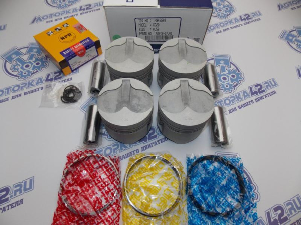 Поршни + кольца к-кт 4шт ремонт +0,50 NISSAN CD20