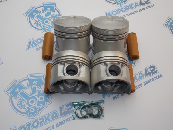 Поршни + кольца к-кт 4шт ремонт +1,00 NISSAN CD20