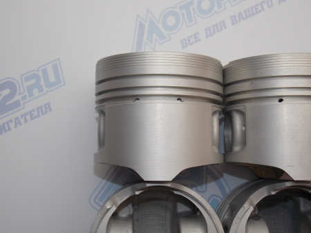 Поршни + кольца к-кт 4шт ремонт +0,50 NISSAN CD20T