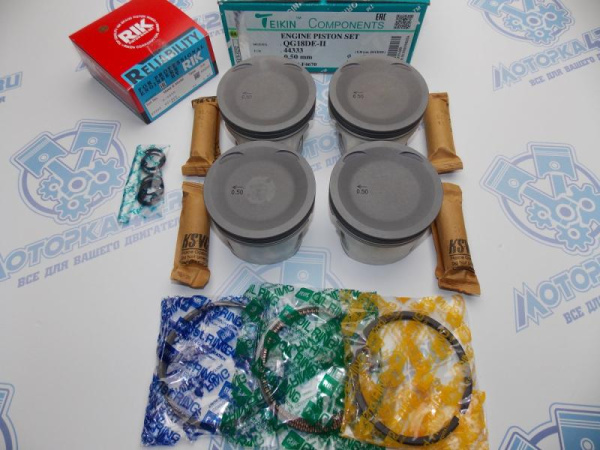 Поршни + кольца 4шт ремонт +0,50 NISSAN QG18DE II
